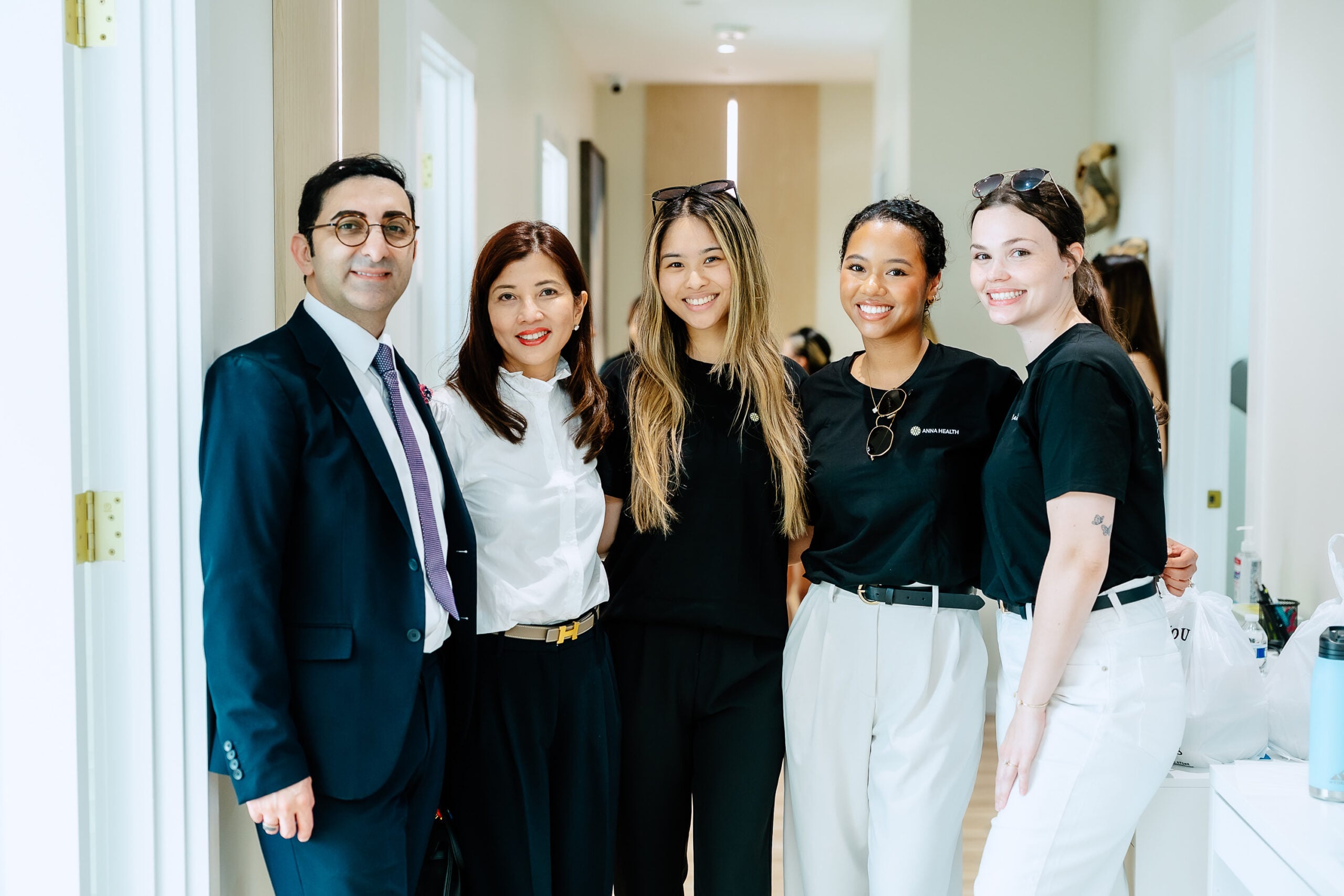 Annandale OB-GYN physician portrait with warm natural light.